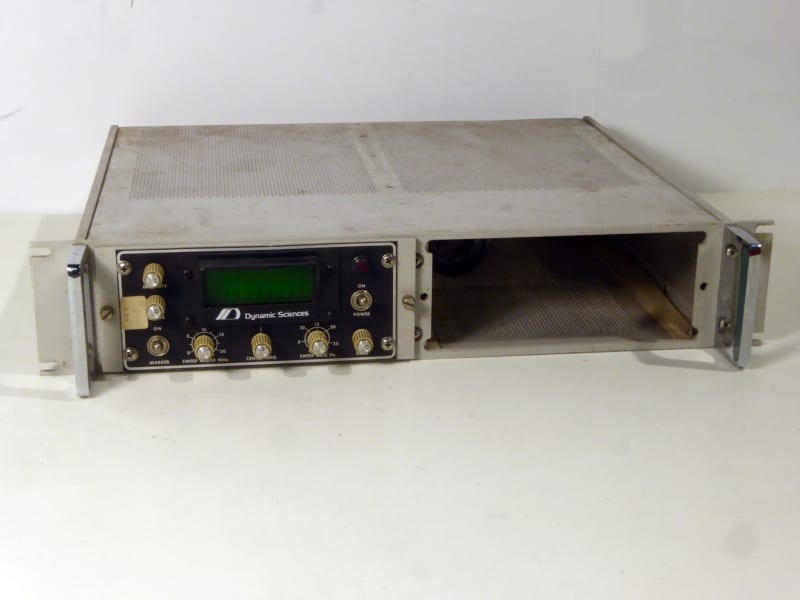 Rack mounting incomplete silver spectrum analyser panel with green display