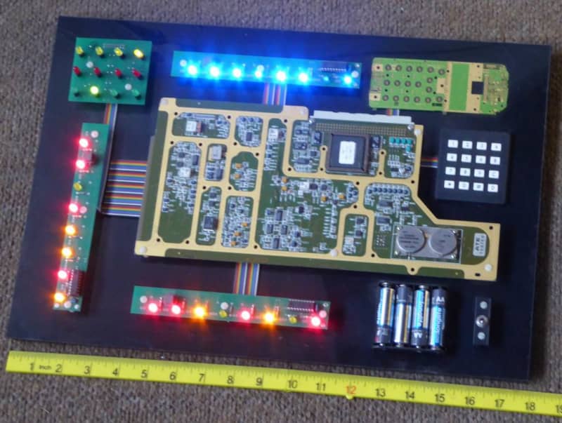 Practical hi-tech looking mounted circuit boards with many twinkly coloured LEDs.