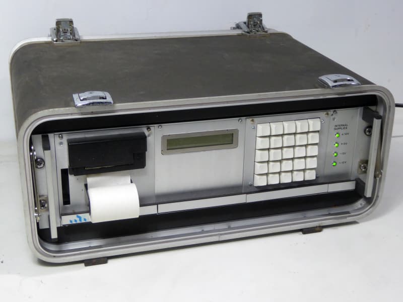 Practical flight case containing keypad, LCD display, strip printer, LEDs