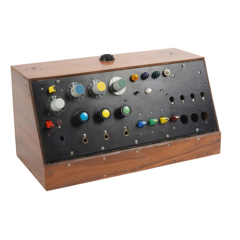 Home-made looking, wooden sloping front, switch & knob control console