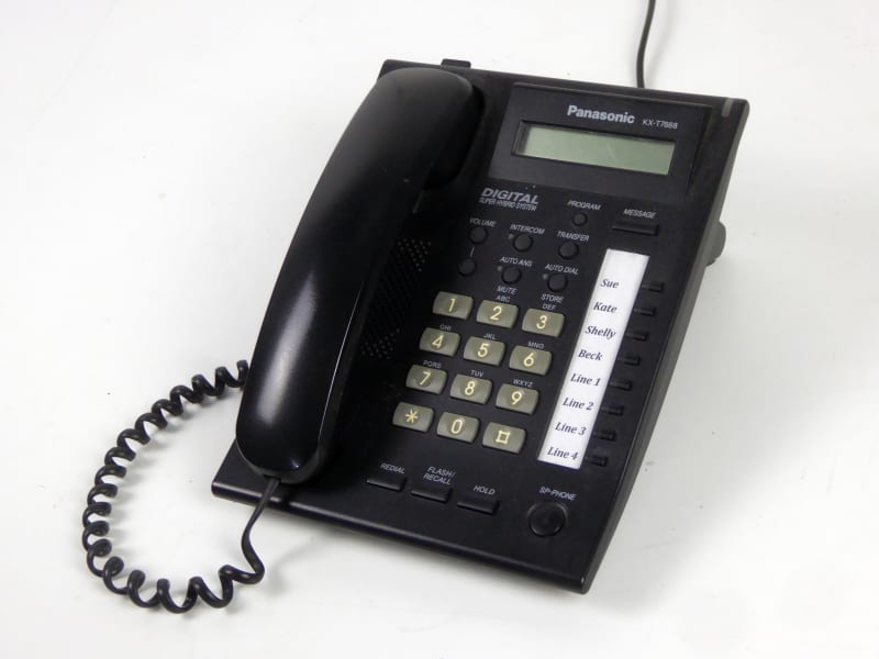 Plain black office phones with speed dial buttons & LCD display