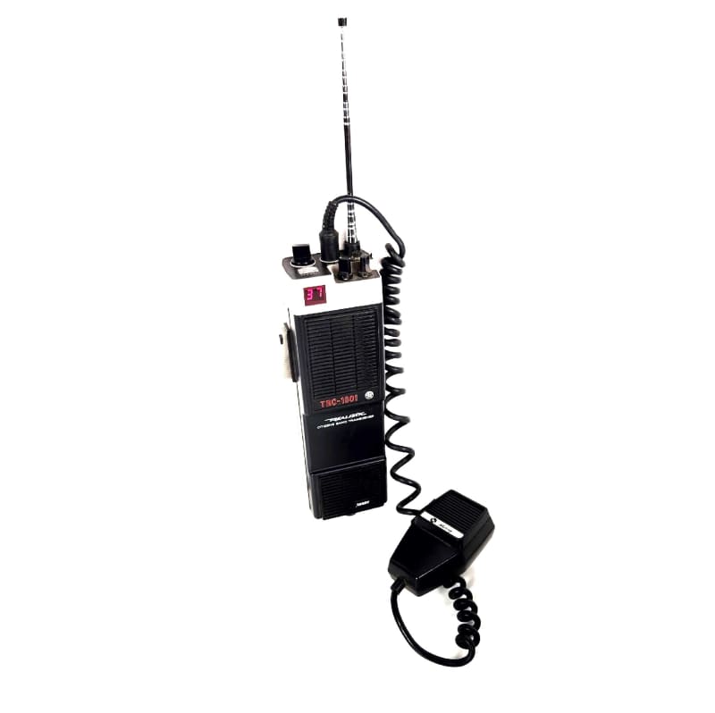 Practical large chunky 1970s walkie-talkie with curly mic, long aerial, digital display