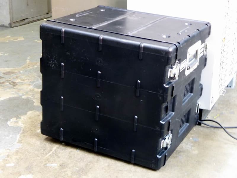 Ruggedised black flight case fitted with standard 19