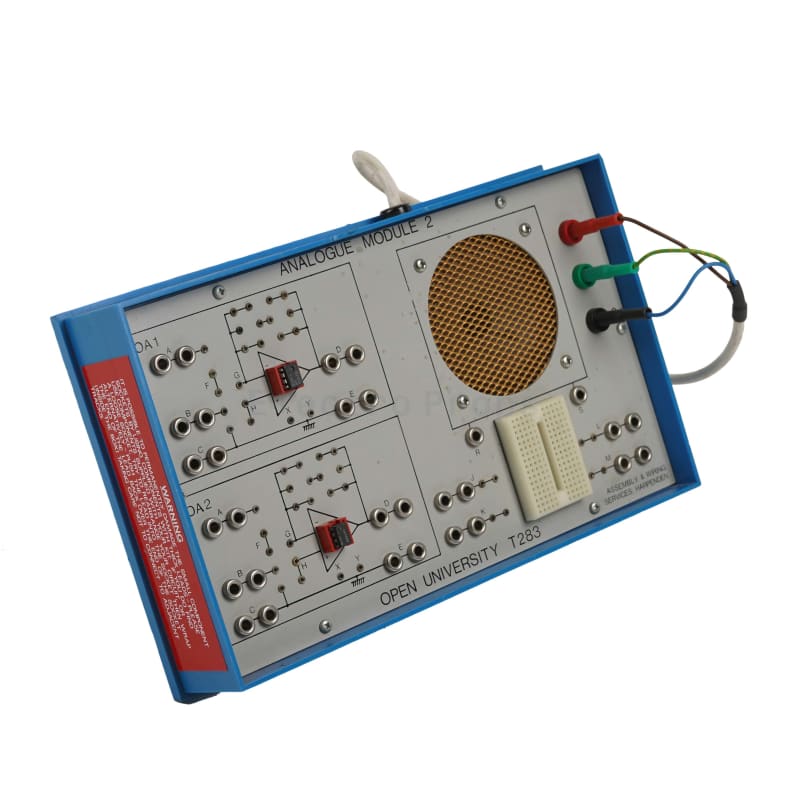 Electronics teaching aid with speaker grill, breadboard connectors