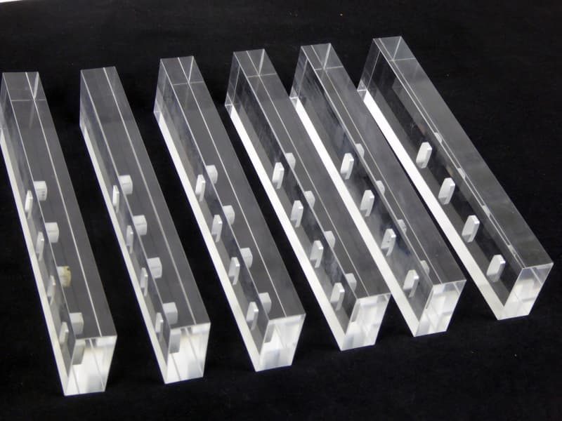 Shiny perspex blocks with cutouts