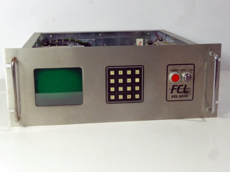 Silver rack mounting control panel with square green display, keypad