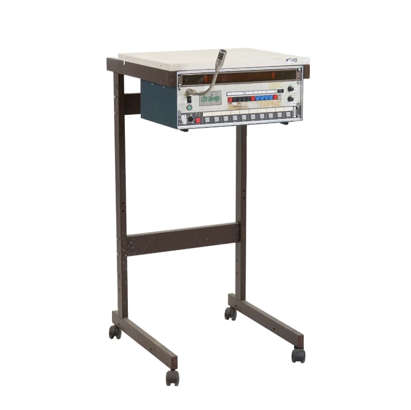 Studio TV/monitor support trolley on wheels with broadcast relevant panels below shelf