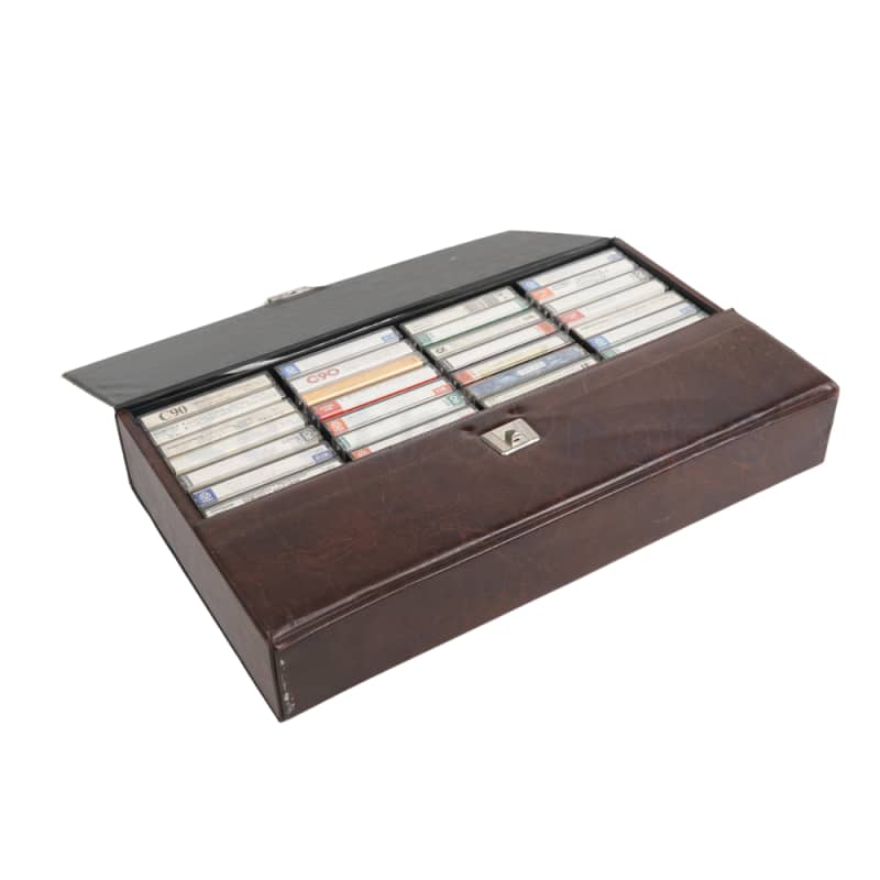 Audio cassettes in brief case style carrying case