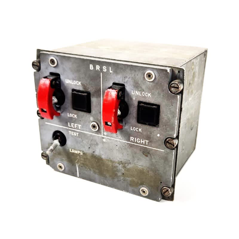 BRSL (Bomb Release Safety Lock) aircraft panel with red cover protected toggle switches