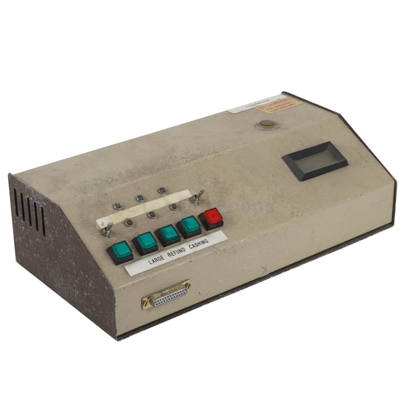 Green & red buttons & LCD display on beige sloping front desktop box