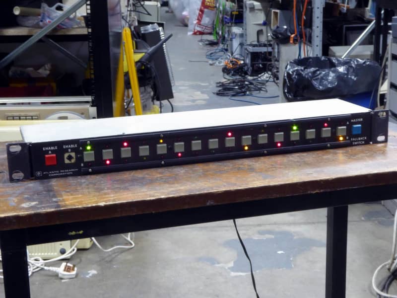 Practical black server panel with red, green, yellow twinkling LEDs & square buttons
