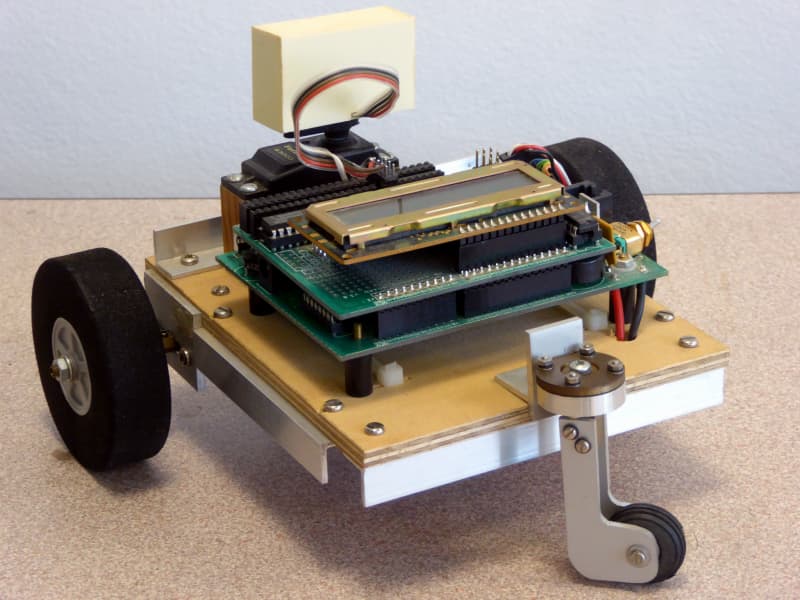 Home-made robot car with exposed electronics & mechanisms