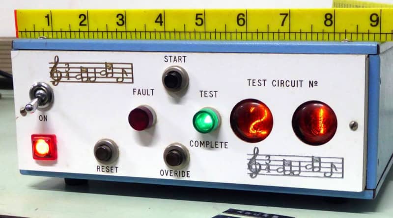 Electronic 1970s test equipment with counting twin nixie number displays.