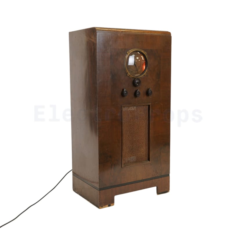 Practical floor standing vintage wireless radio in wooden case with backlit tuning scale