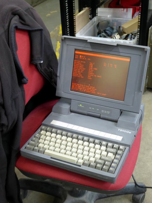 Practical 1989 Toshiba luggable laptop with orange plasma screen
