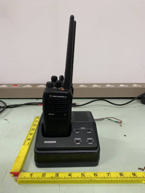 Modern Motorola Walkie Talkies & Charging station Electro Props Hire
