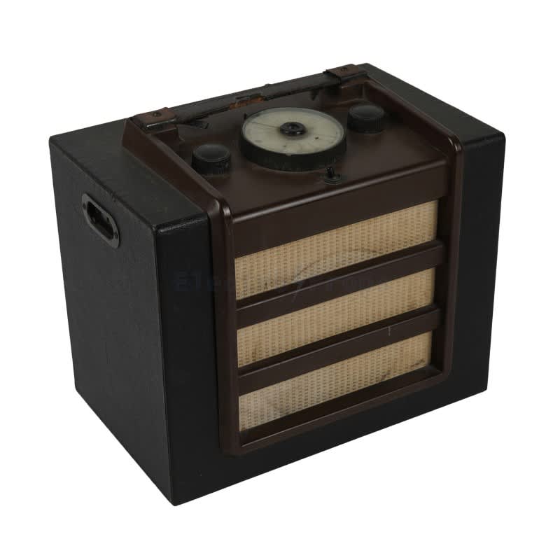 Vintage period valve radio in rexine covered case with prominent tuning knob