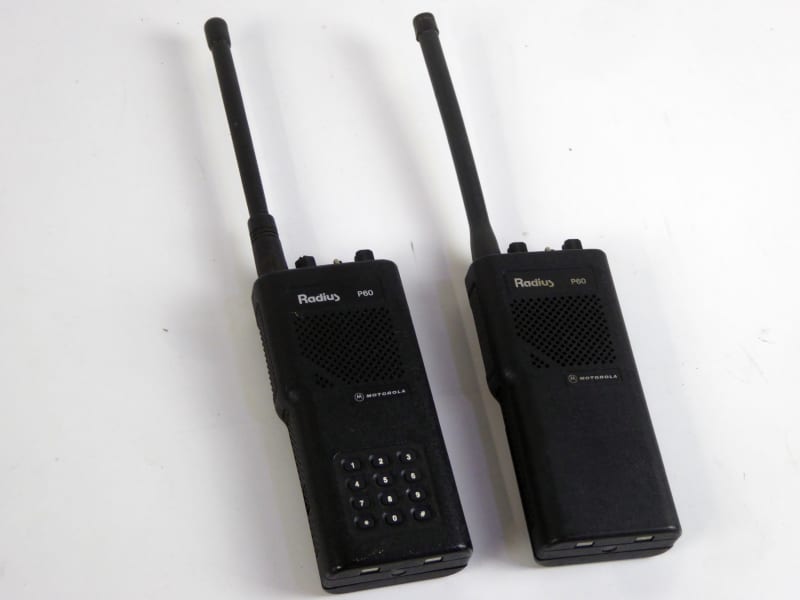 Motorola P60 1990s black Walkie-talkies with optional charger bases