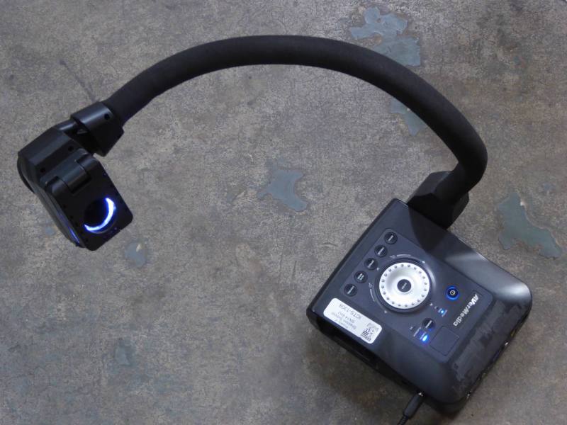 Practical goose neck video camera on stand with tilting illuminator