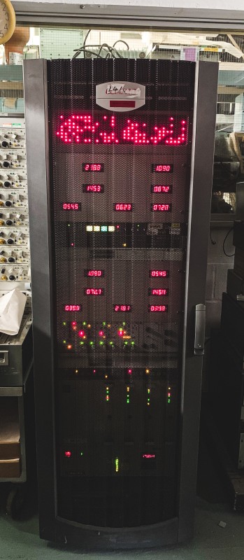 Modern looking server rack with mesh front door | Electro Props Hire