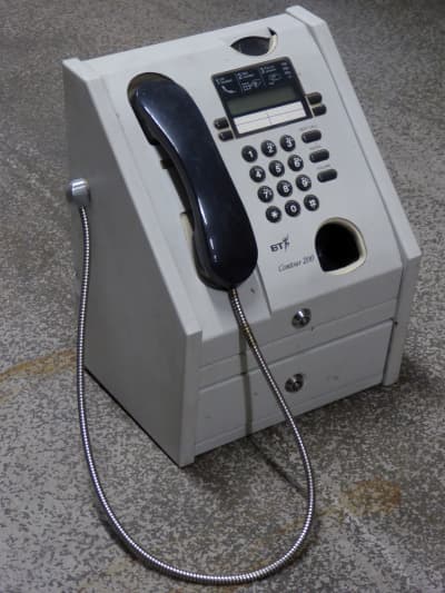 Public wall mount pay telephone