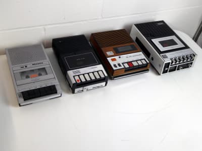 Portable 1970s cassette tape recorder/player in silver & black