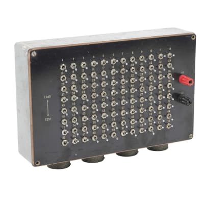 Box with dense matrix of 96 small switches, coloured terminals