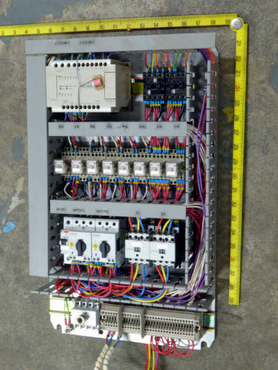 Electrical control box innards with wiring loom, circuit breakers, timers, PLC etc