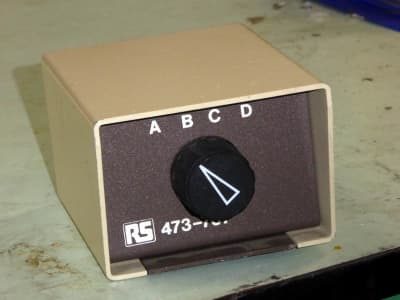 Small cream & brown rotary video source select switch