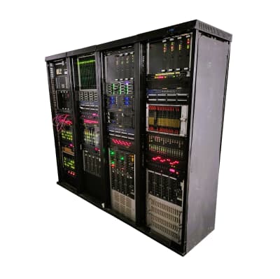 Run of 4x practical black server racks with colourful LEDs