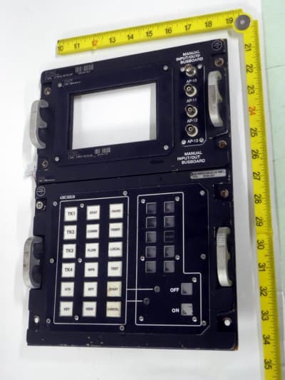 Tech looking panel with square buttons, connectors & cutout for tablet screen