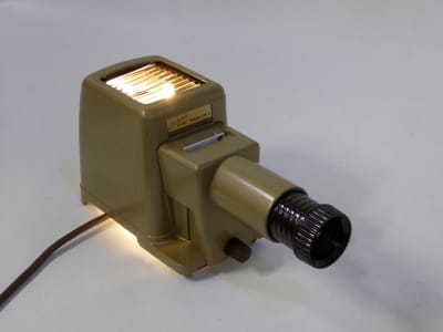 Practical 1950s-1960s photographic slide/transparency projector