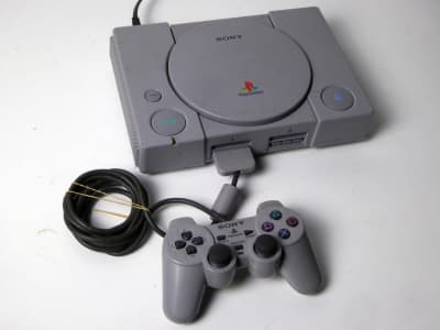 Sony Play Station 1 PS1 games console with twin controllers