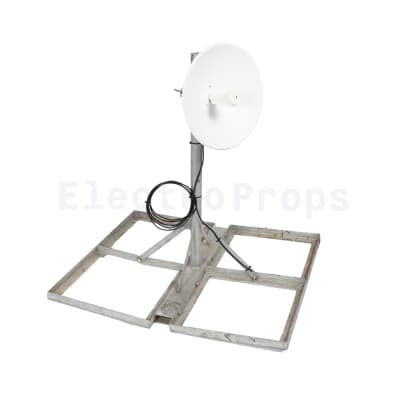 Small commercial rooftop dressing microwave communications dish on stand