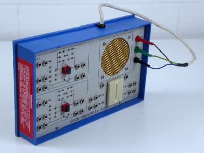 Electronics analogue teaching module with speaker grill, breadboard