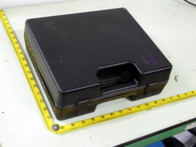 Small black plastic component carrying cases