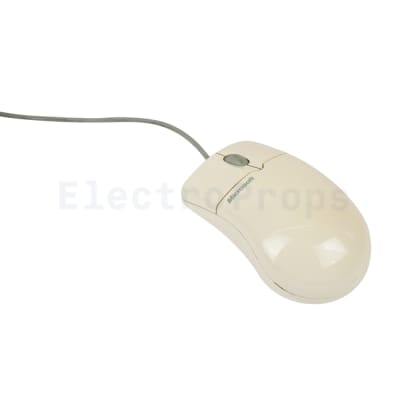 Beige 1990s Microsoft mouse 