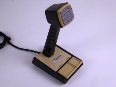 Brown & beige desk microphone with angled head & Press To Talk buttons
