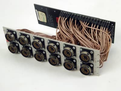Multiple circular connectors with woven copper coloured umbilical cables