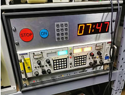 Desktop cabinet with microwave countdown timer and flashing lights