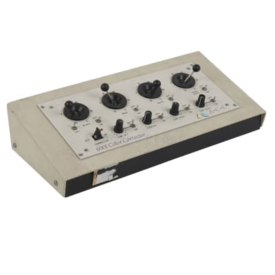 Quadruple joysticks & knobs on beige sloping desktop console
