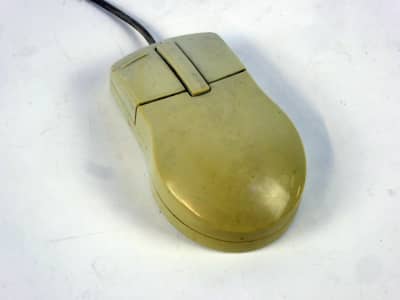 Beige 1980s-1990s computer mouse