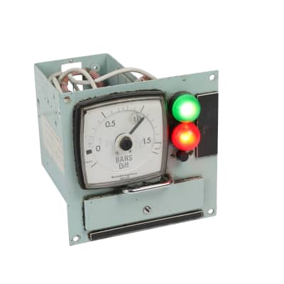 Navy panel with large domed coloured lamps & analogue meter