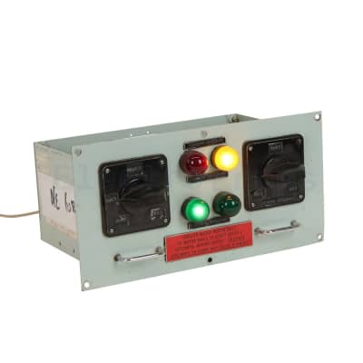 Non-practical navy control panels with large domed lamps & chunky rotary switches