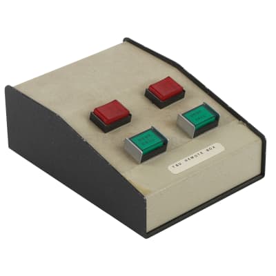 Red & green buttons on small sloping front desktop box