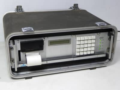 Practical flight case containing keypad, LCD display, strip printer, LEDs