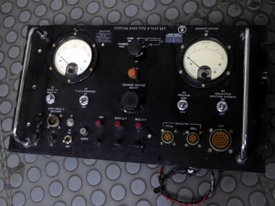 Period black control panel with twin analogue meters, switches & knobs