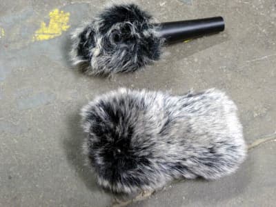 Fluffy microphone cover/wind roar preventer.