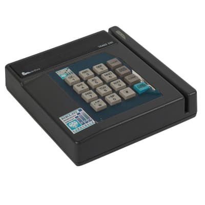 Counter top numeric keypad with swipe card slot