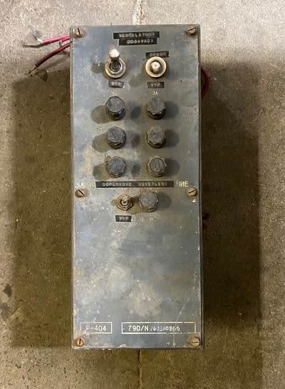 Distressed cold war era electrical switch box in battleship grey